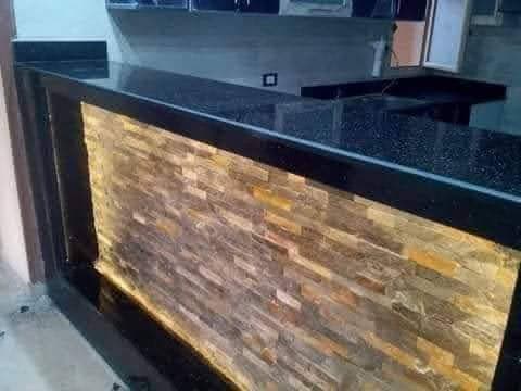 Comptoir arrondi en pierre noire — visuel 2